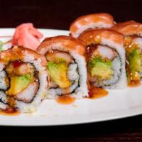 Spider Roll · 5 large pieces. Tempura kani and avocado topped with salmon, caviar and sweet spicy sauce.