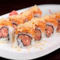 Spicy Lover Roll · Spicy tuna crunch inside topped with spicy salmon and crunch.