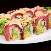 Trump Roll · Kani,cucumber, avocado, topped with tuna, avocado, caviar, crunch with sweet sauce and spicy...