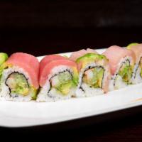 Rainbow Roll · Imitation crab, cucumber, avocado, topped with salmon, tuna, yellowtail and avocado.