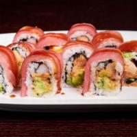 Great Wall Roll · Squared roll with spicy salmon, kani, avocado topped with tuna and sweet sauce.