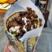 Lamb Gyro Sandwich  · Lamb on pita bread. Comes with lettuce, tomatoes, fried onions and our customer favorite whi...