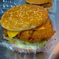 Chicken Zinger Sandwich · Spicy and crispy! Served with mayo, lettuce, tomato and cheese.