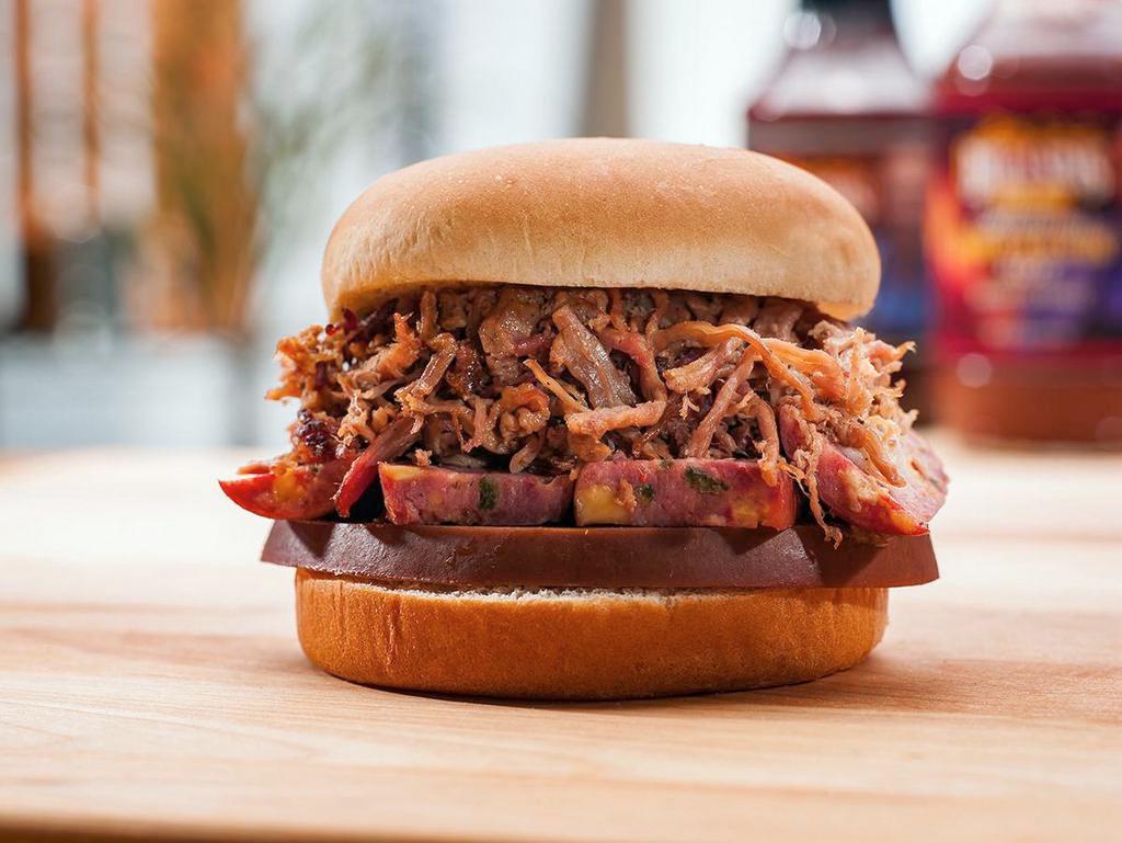 The Heisman Sandwich · Choice of pulled pork or chopped brisket with a slice of bologna and hot link. Served with 1 side, pepper, red onion and pickle.