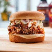 The Triple 20 Sandwich · Pulled pork drizzled with Billy's secret sauce and topped with coleslaw and provolone cheese...