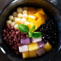 House Special Coconut Grass Jelly 招牌椰汁烧仙草 · Served with mango, red bean and pellets.