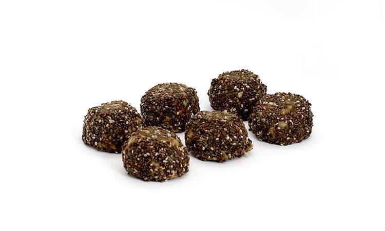Peanut Butter Chia Energy Bites · chia seeds, peanut butter, oats, flax meal,  puffed rice, coconut oil, dates, peanuts, bananas, chocolate chips, calma honey