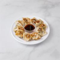 8. Vegetable Dumplings · 8 pieces. Served with a choice of style.