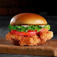 Chicken Sandwich · Grilled or Crispy chicken breast with mayo lettuce, tomato, and pickles.
