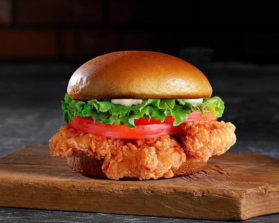 Chicken Sandwich · Grilled or Crispy chicken breast with mayo lettuce, tomato, and pickles.