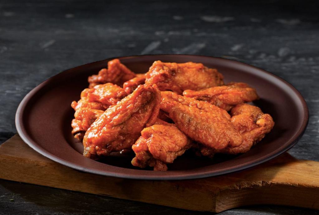 Hot Wings  · Crispy chicken wings covered with your choice of sauce - Original Buffalo Sauce, Tangy BBQ, or Mango Habanero.