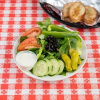Garden Salad · Lettuce, tomato, cucumber, carrots, black olives and green peppers. Served with pita bread a...