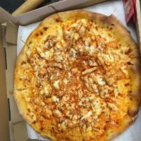 Spicy Buffalo Chicken Pizza · Spicy chicken, bleu cheese and mozzarella cheese. Pizza is hand tossed and cooked in a brick...