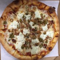 Frango Pizza · Chicken, sauce, mozzarella, green olives, catupiry cheese and oregano. Pizza is hand tossed ...