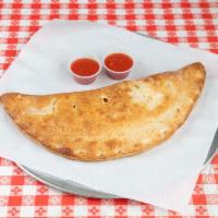 Friends Calzone · Spinach, tomatoes, black olive, feta and mozzarella cheese. 