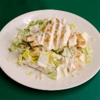 Chicken Caesar Salad · Romaine, croutons, Parmigiana cheese. Add shrimp for an additional charge.
