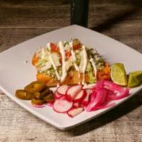 Tacos Dorados · Birria tacos, guacamole cabbage, pico de gallo, queso and Mexican sour-cream. 