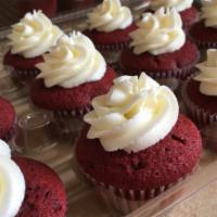 Red Velvet Cupcake · Classic red velvet cupcake infused with chocolate chips topped with vanilla cream cheese but...