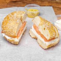 Hand-Sliced Nova Lox Bagel Sandwich · Cream cheese, red onions, tomato roasted papers 
on roll, slice bread or any bagel of choice.
