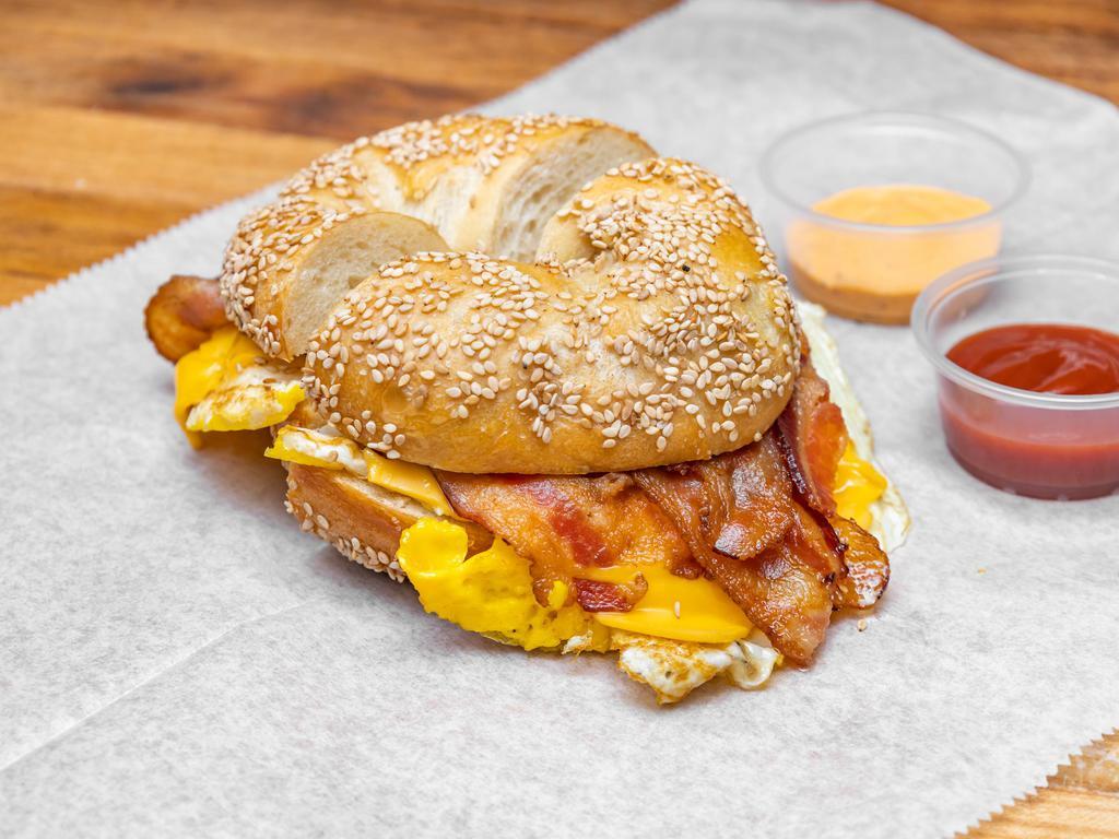 The Heart Attack Sandwich · 3 eggs, ham, sausage, bacon and cheese.
on roll, slice bread or bagel.