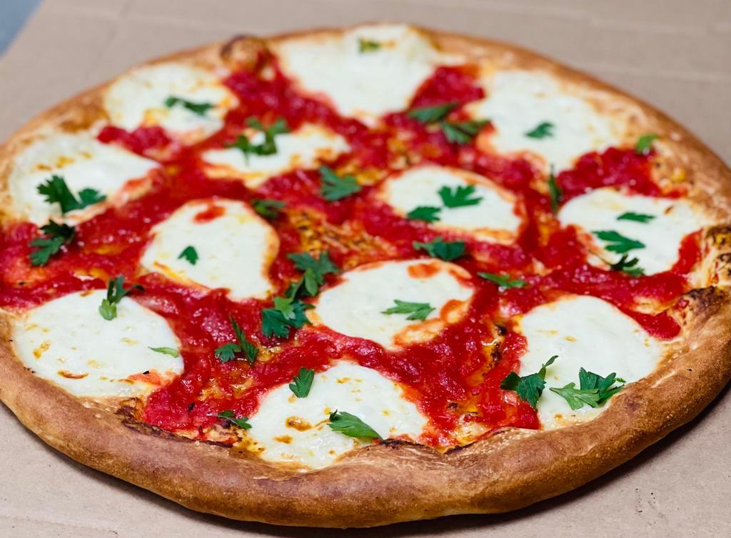 Margherita Pizza · Neapolitan pizza, made with fresh mozzarella cheese, fresh basil, salt and extra-virgin olive oil.
