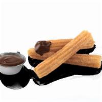 Churros · Churros covered with cinnamon sugar with a choice of Dip Chocolate or White Icing