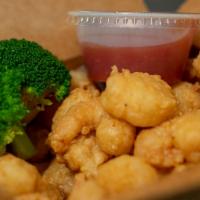 Popcorn Shrimp · Perfect little bitesize, crunchy, and flavorful shrimps pair with cocktail sauce will have y...