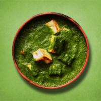 Green Cottage Curry · Indian cottage cheese cooked with fresh spinach an Indian herbs and spices and cream. Served...