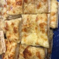 Garlic Square with Cheese  · 1 piece. Garlic squares topped with garlic and olive oil including fresh oregano and basil h...