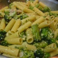 Pasta with Broccoli · Rigatoni pasta in garlic and olive oil, with sauteed heads of broccoli, topped with fresh ba...
