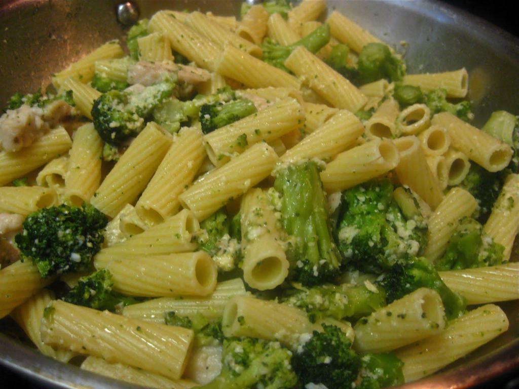 Pasta with Broccoli · Rigatoni pasta in garlic and olive oil, with sauteed heads of broccoli, topped with fresh basil and grated parmesan cheese.
