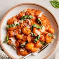 Gnocchi  · Gnocchi pasta in our signature marinara sauce topped with fresh basil and grated parmesan ch...
