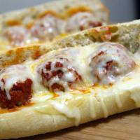 Meatball Parmigiana Hero · Meatballs in our signature marinara sauce topped with melted grilled house blend of three ch...