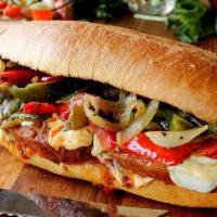 Sausage & Peppers Hero · Sauteed sausages & peppers either with or without our signature marinara sauce, in our toast...