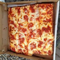 Sicilian Pizza · Tomato sauce, traditional sicilian thick crusted and rectangular.