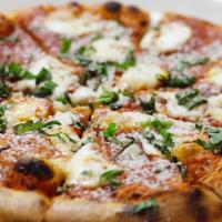 Margherita Pizza · Grandma. Tomato sauce and fresh mozzarella, fresh basil. Marinara $18.00 tomato sauce fresh ...