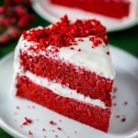 Red Velvet Cake · Our red velvet cake, is a scarlet-colored chocolate layer cake, layered and frosted with sum...