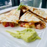 Chicken parmigiana quesadilla · Chicken, mozzarella cheese and marinara sauce