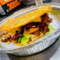 Patacon · Grill chicken breast, bacon , lettuce, tomato, chipotle Mayo , cheese and green plantain 