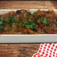 Saksuka · Potato, peppers, green tomatoes, eggplant
cooked in olive oil, and marinara sauce.