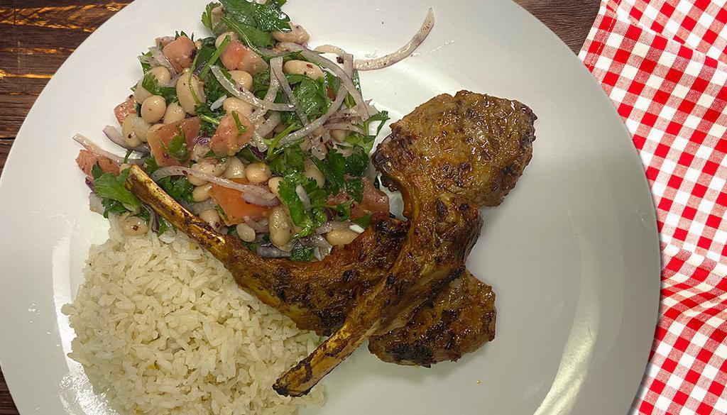 Lamb Chops · 2 grilled chops, Served with Turkish bulgur rice, and bean salad.
