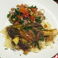 Lamb Shank · Served with market vegetables, and rice