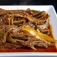 Ropa Vieja · Shredded beef. Served with your choice of 2 sides.