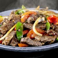 Fajitas de Bistec · Steak Fajita. Served with 2 sides.