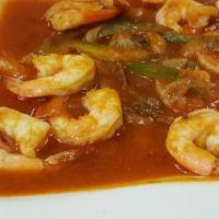 Camarones Enchilados · Shrimp in Creole sauce.