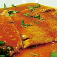 Filete de Pescado al Ajillo · Fish filet in garlic sauce.