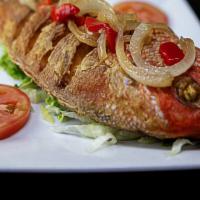 Pargo Frito · Fried Red Snapper. Served With Your Choice of 2 Sides.