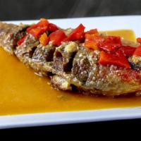 Pargo al Ajillo · Snapper in Garlic Sauce. Served With Your Choice of 2 Sides.