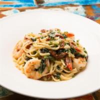 Shrimp Linguini · Sun-Dried Tomato, Baby Spinach, in a Beurre Blanc Sauce.