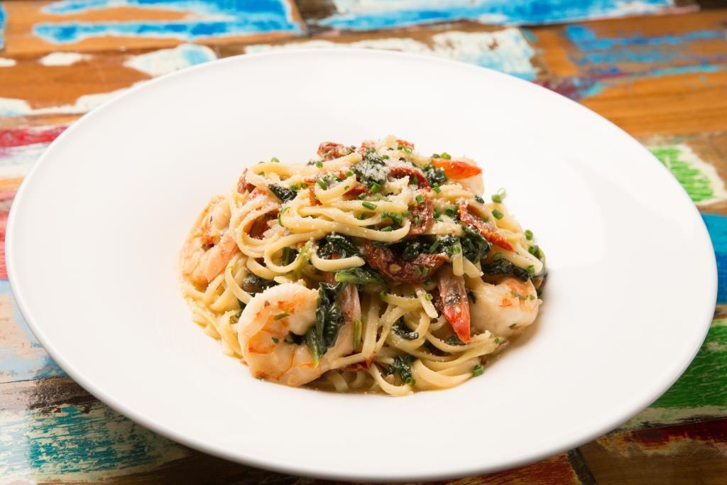 Shrimp Linguini · Sun-Dried Tomato, Baby Spinach, in a Beurre Blanc Sauce.